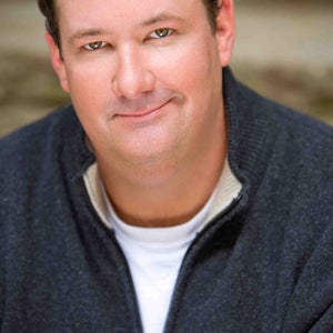 Photo of Brian Baumgartner, click to book