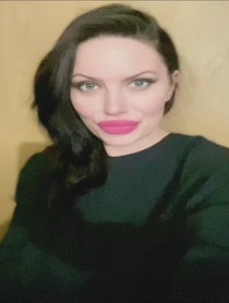Poster for Holiday video from Angelina Jolie Impersonator