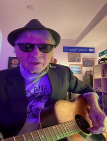 Poster for Holiday video from Tommy Tutone