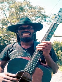 Poster for Birthday video from Brushy One String