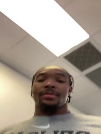 Poster for Holiday video from Devonte Graham