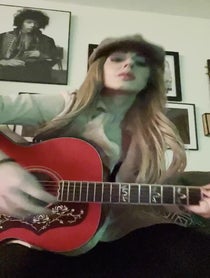 Poster for Christmas video from Orianthi