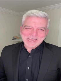 Poster for Birthday video from David Siegel George Clooney Look Alike