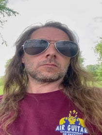 Poster for Pep Talk video from Stonehenge Air Guitarist