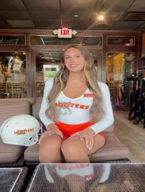 Poster for Pep Talk video from Hooters Boca Raton