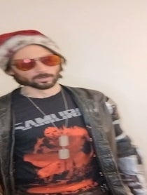 Poster for Holiday video from Keanu reeves lookalike