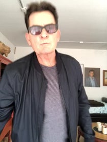 Poster for Otros video from Charlie Sheen