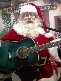 Poster for Holiday video from Singing Santa