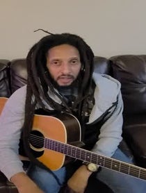 Poster for Give Thanks video from Julian Marley