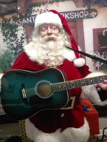 Poster for Holiday video from Singing Santa