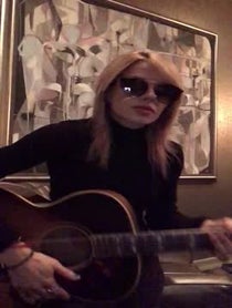 Poster for Holiday video from Orianthi